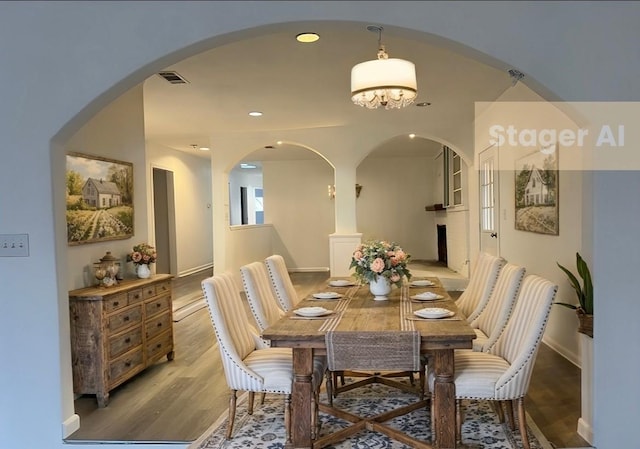 dining area featuring wood-type flooring