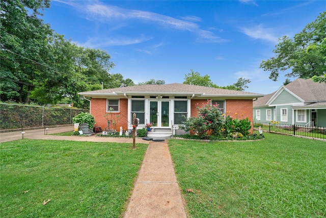 view of front of property with a front lawn