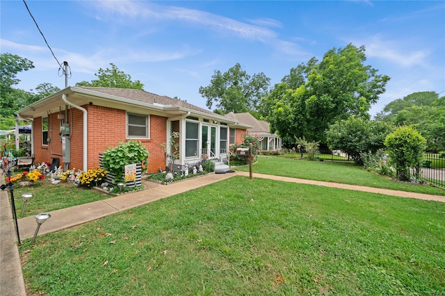 view of front of home featuring a front lawn