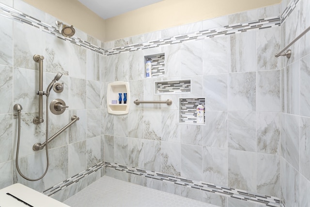 bathroom featuring tiled shower