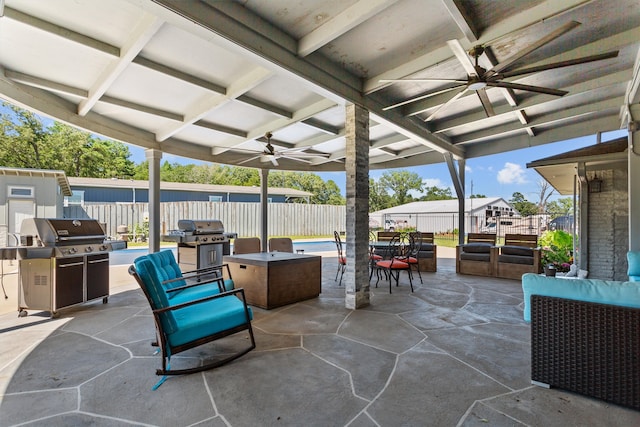 view of patio featuring grilling area and ceiling fan