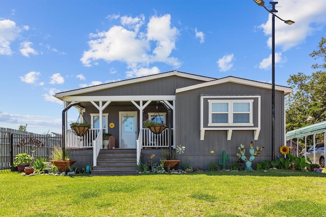 view of front of home with a front yard