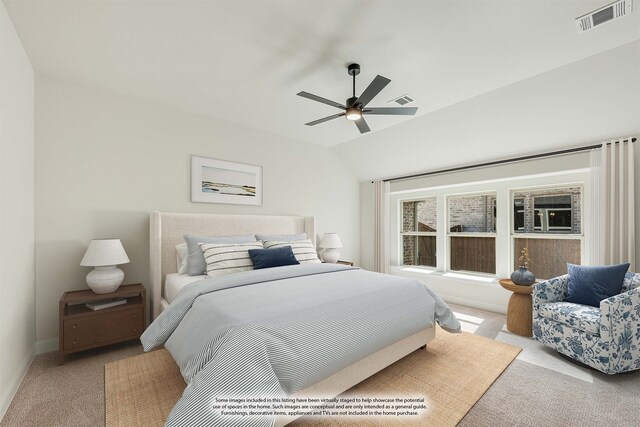 bedroom featuring lofted ceiling, light colored carpet, and ceiling fan