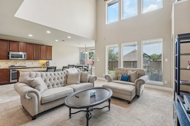 living room featuring light carpet