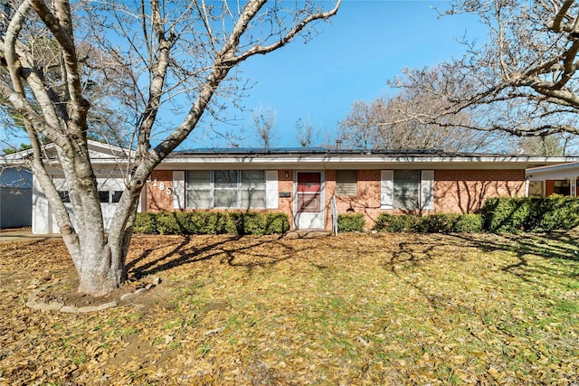 ranch-style house with a front lawn