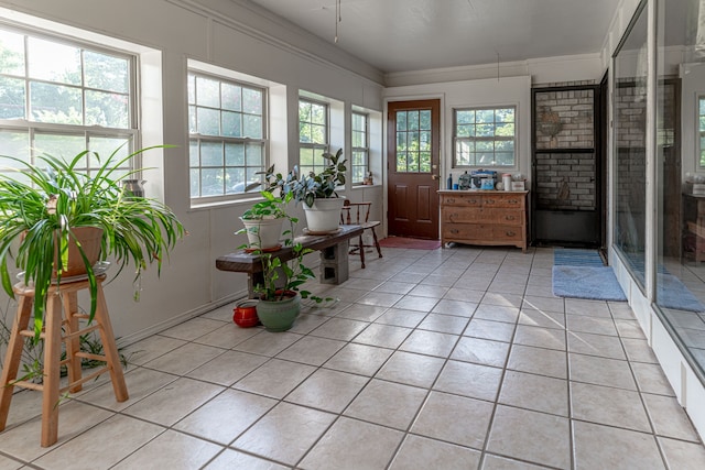 unfurnished sunroom featuring plenty of natural light