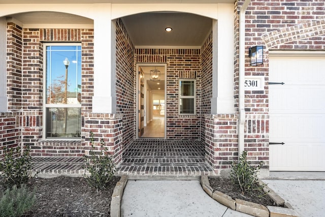 property entrance with a garage