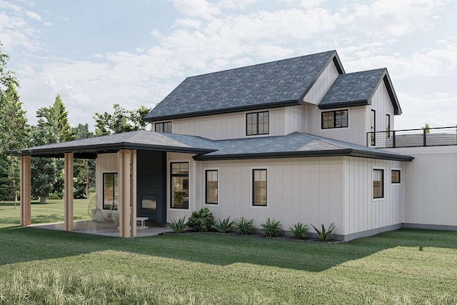 back of house with a patio area and a lawn