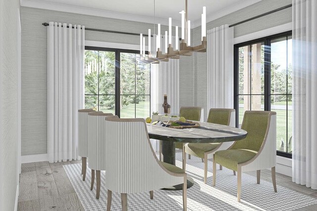 dining space featuring an inviting chandelier, a healthy amount of sunlight, crown molding, and hardwood / wood-style floors