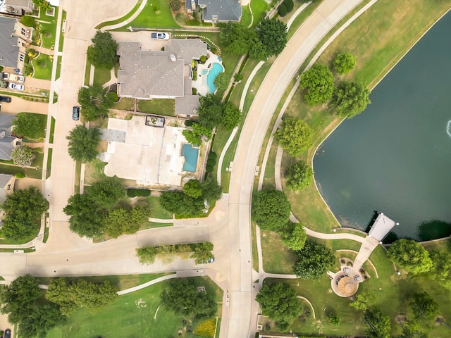 drone / aerial view with a water view