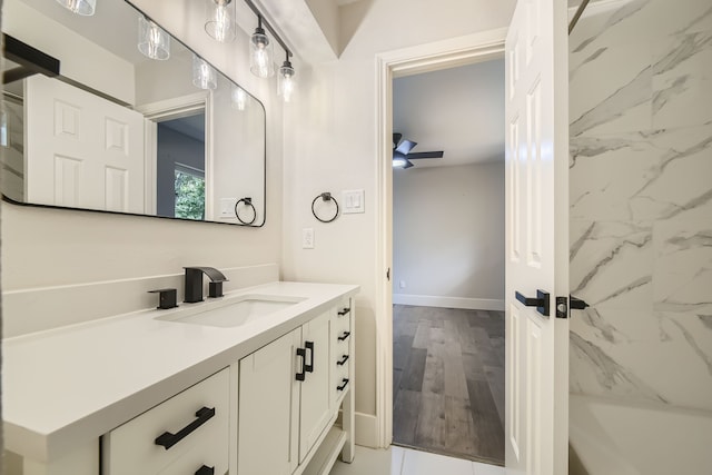 bathroom featuring vanity, ceiling fan, and hardwood / wood-style floors