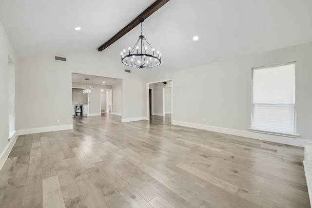 unfurnished living room with vaulted ceiling with beams, light wood-type flooring, and a chandelier