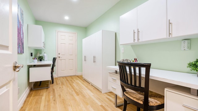 office space with light hardwood / wood-style floors