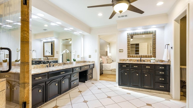 bathroom with vanity, ceiling fan, tile patterned floors, and crown molding