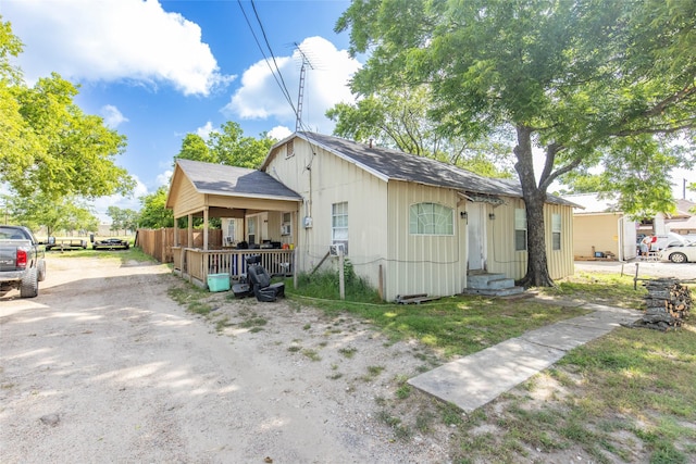 view of front of home featuring covered porch