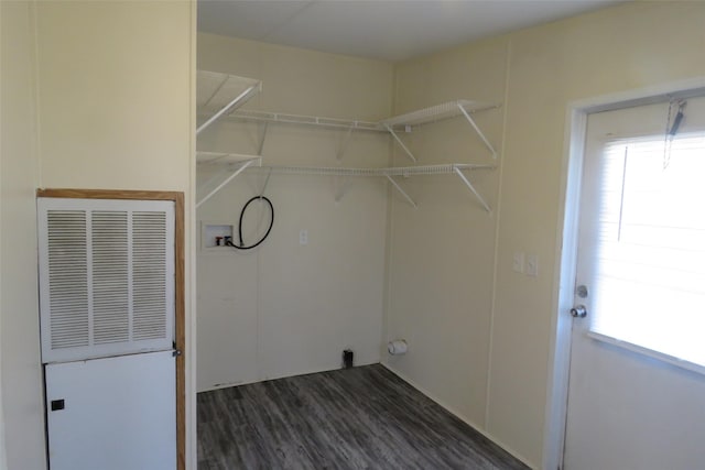 laundry room with dark hardwood / wood-style flooring and hookup for a washing machine