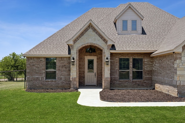 view of front of house with a front lawn