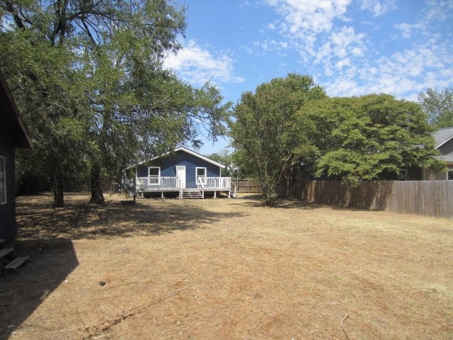 view of yard featuring a deck