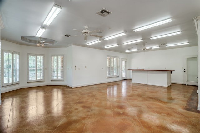 interior space with crown molding and ceiling fan