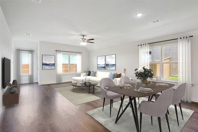 dining space with dark hardwood / wood-style floors and ceiling fan