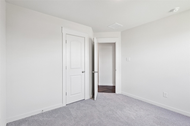 view of carpeted spare room