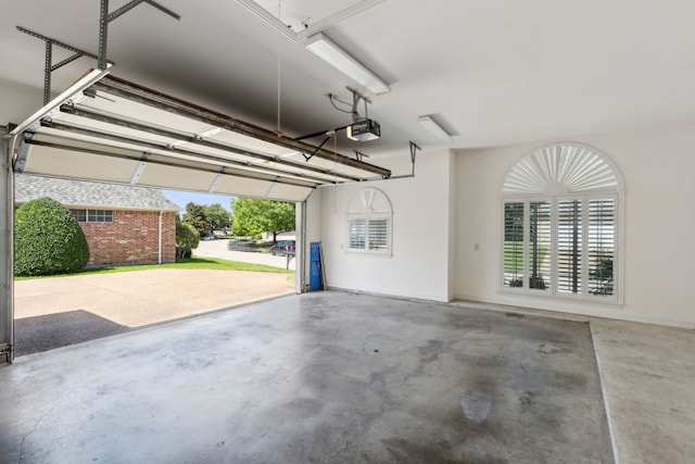 garage featuring a garage door opener