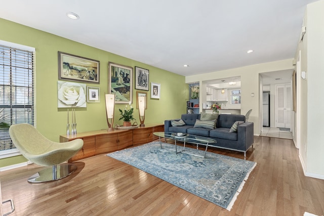 living room with light hardwood / wood-style floors