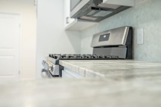 interior space featuring white cabinets