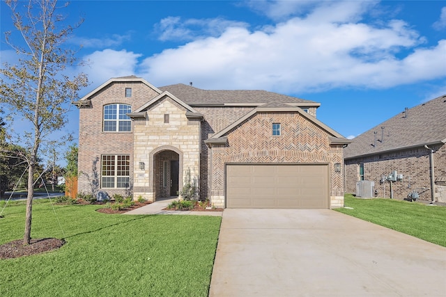 view of front facade featuring a garage, a front yard, and cooling unit