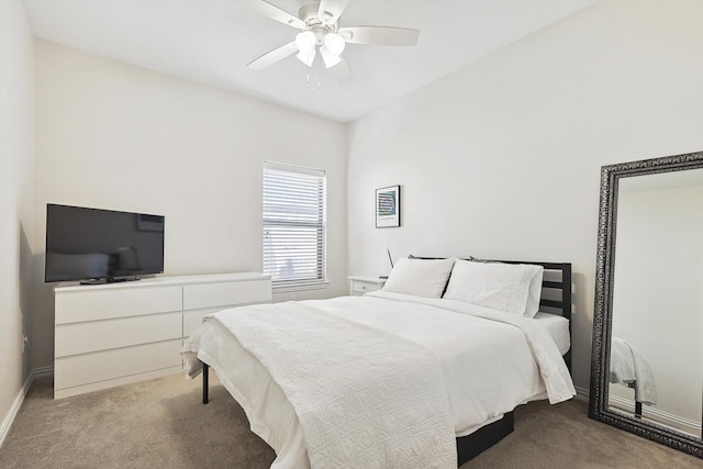 bedroom with ceiling fan and carpet floors