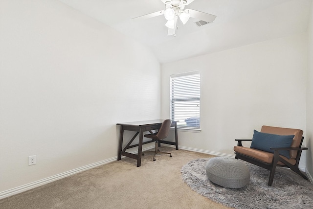 sitting room with lofted ceiling, ceiling fan, and carpet