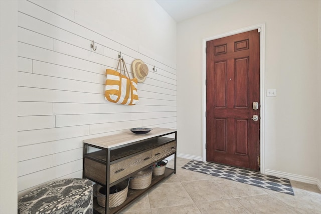 mudroom featuring light tile patterned flooring