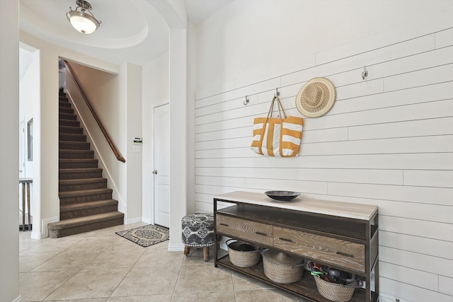 mudroom featuring light tile patterned flooring