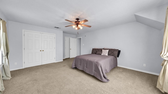 bedroom featuring light carpet, ceiling fan, and lofted ceiling