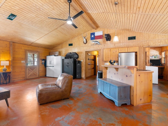 living room featuring ceiling fan, wooden ceiling, lofted ceiling with beams, wood walls, and concrete flooring