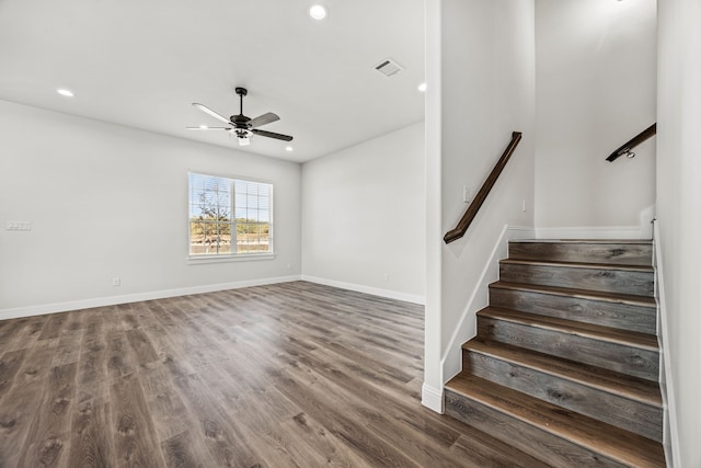 bedroom featuring light colored carpet and ceiling fan