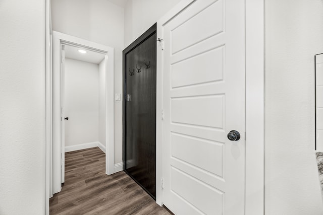 bathroom featuring walk in shower and vanity