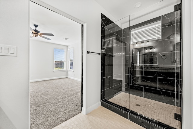 walk in closet featuring light colored carpet