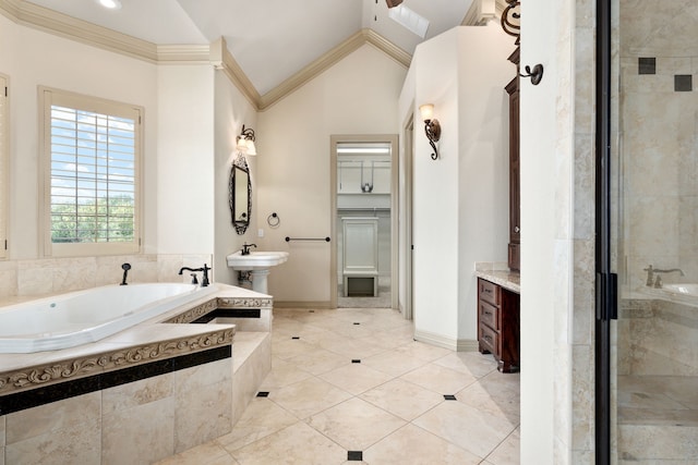 bathroom with tile patterned floors, ornamental molding, independent shower and bath, and vaulted ceiling