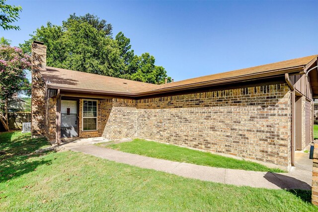 exterior space with a front yard