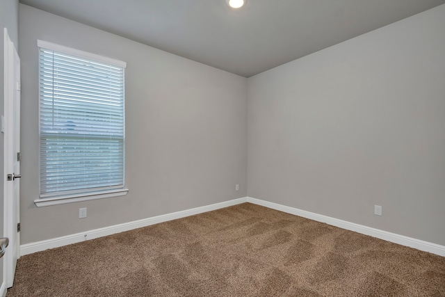 view of carpeted spare room