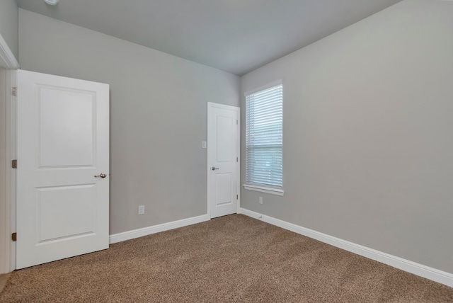 empty room with carpet floors