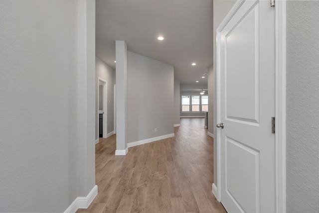 corridor featuring light hardwood / wood-style flooring