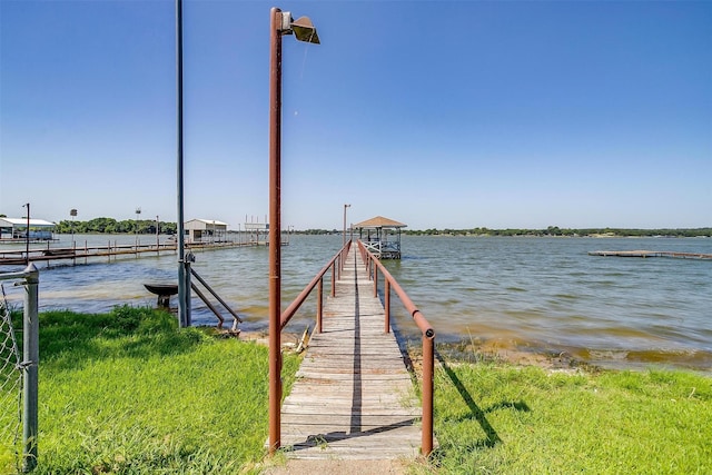 view of dock with a water view