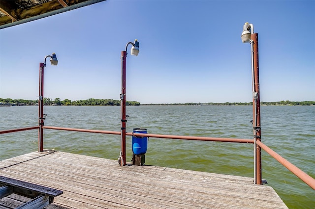 view of dock with a water view