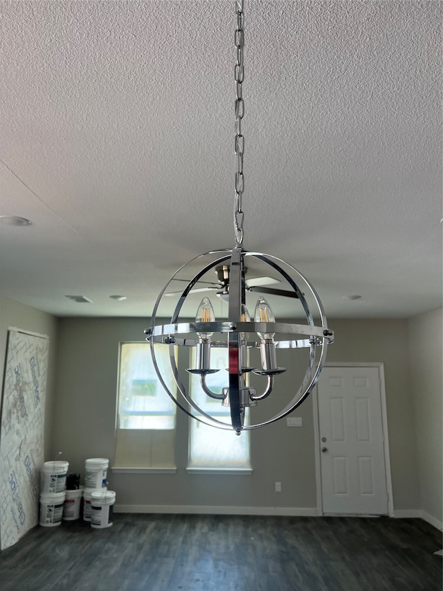 interior details featuring a textured ceiling