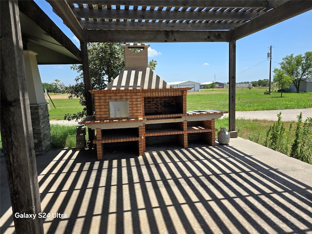 view of patio / terrace featuring a pergola