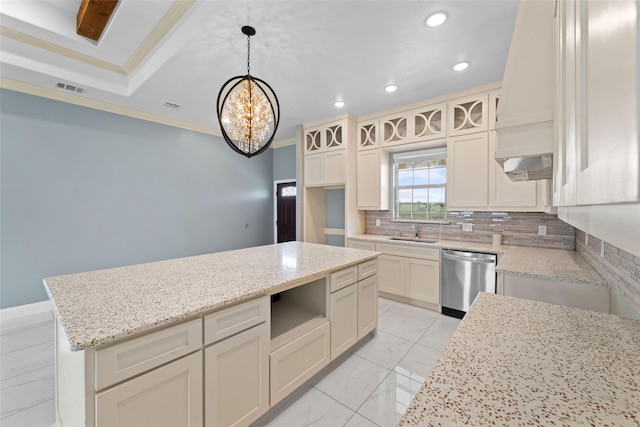 kitchen with decorative backsplash, stainless steel dishwasher, crown molding, decorative light fixtures, and a chandelier