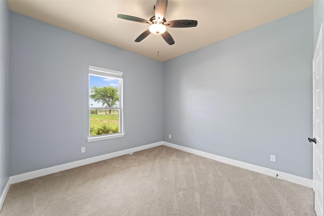 unfurnished room featuring carpet flooring and ceiling fan