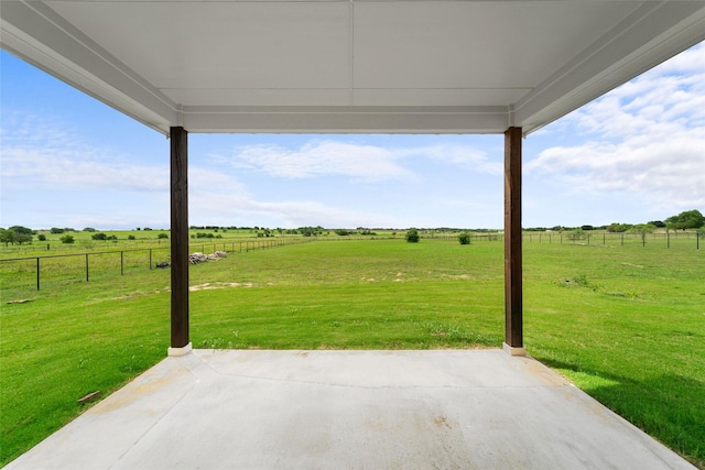 view of patio / terrace featuring a rural view